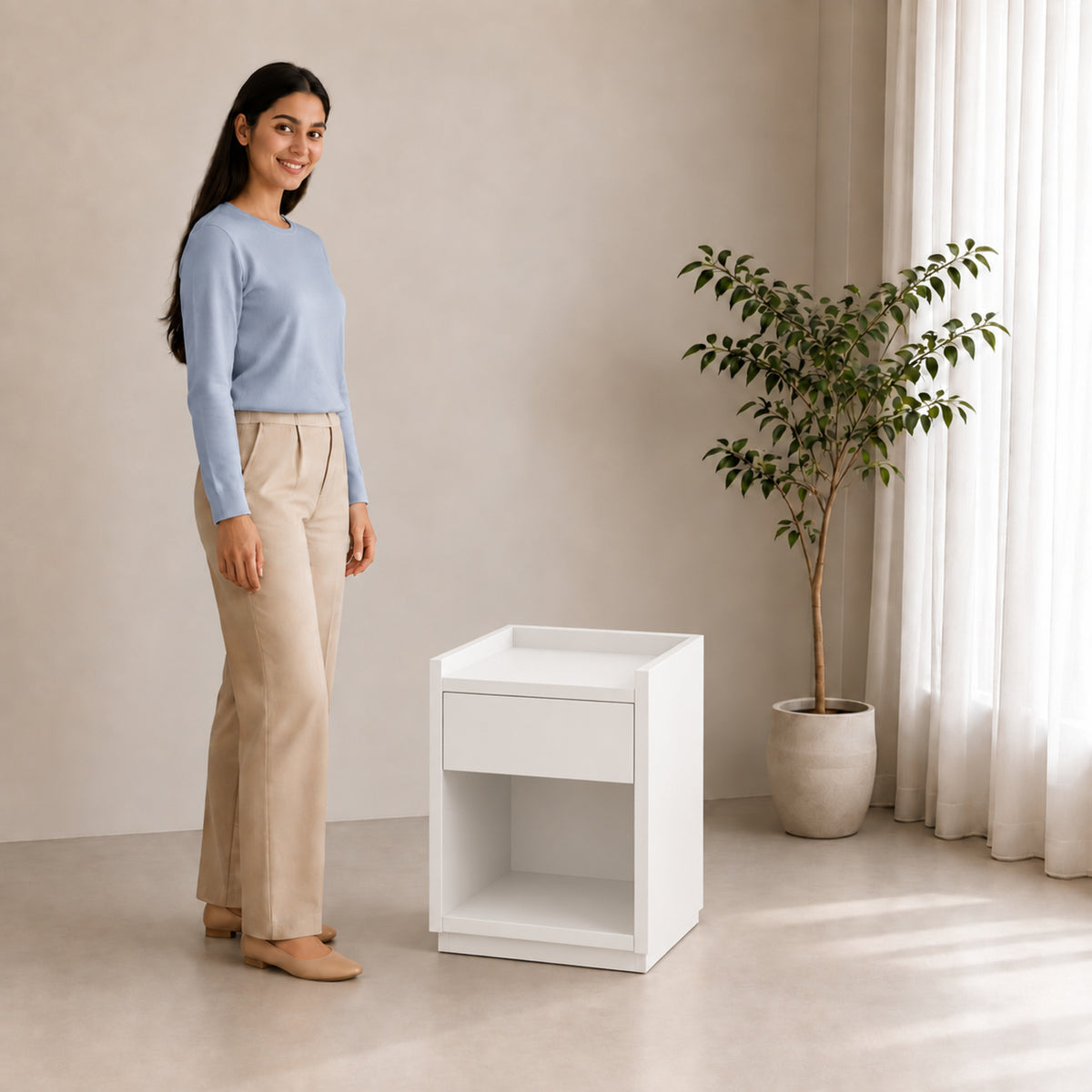 Right Work Tray white side table, three-quarter lifestyle view with smiling woman against beige background